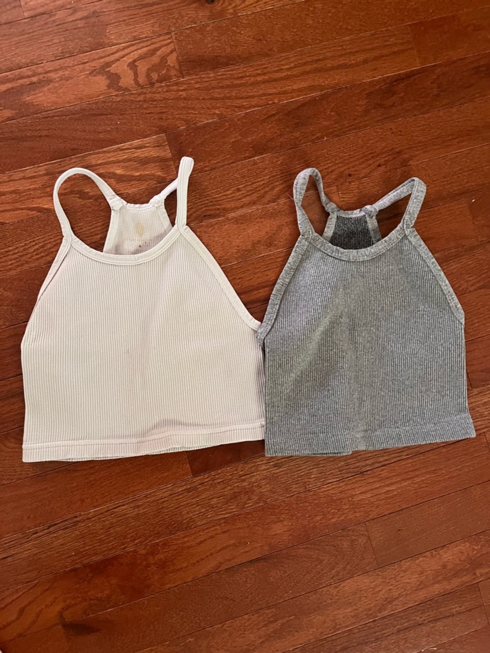 Cropped rib knit tanks from free people. Xs/d. One grey the other steel grey.